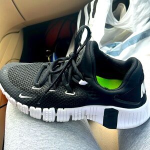 Black Nike Tennis Shoe